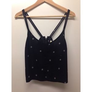 Silence + Noise crop tank with cross design