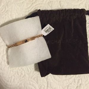 Gold Micheal Kors beaded bracelet.