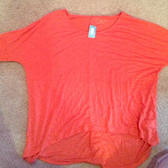 Orange oversized off the shoulder shirt