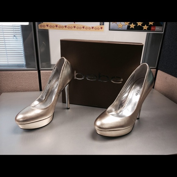 Bebe gold pumps