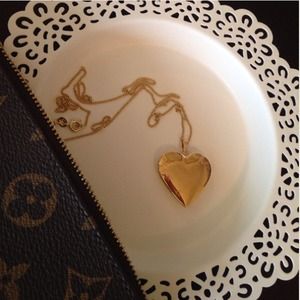 Gold heart locket necklace
