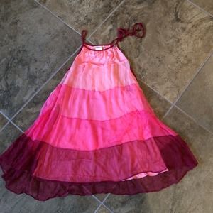 Pink sheer top w/pink lining. Ties around neck.