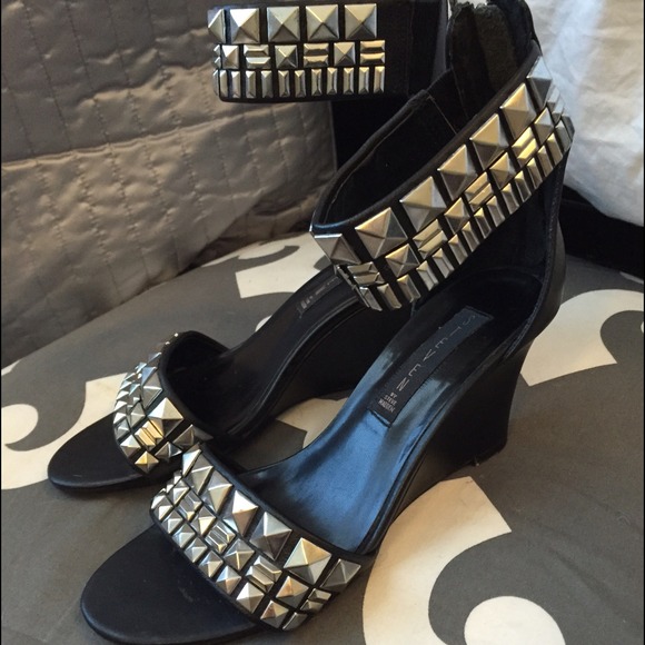 SOLD Steve Madden stud wedge leather heel.