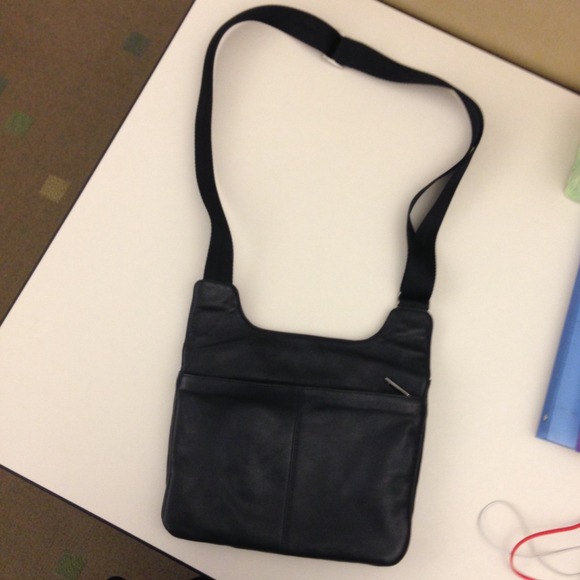 Tumi crossover hand bag