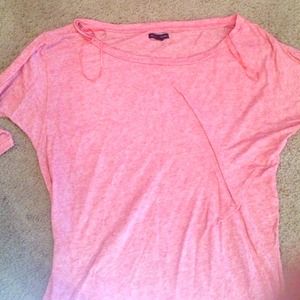 Peach colored shirt