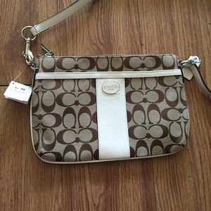 Coach signature purse with white leather