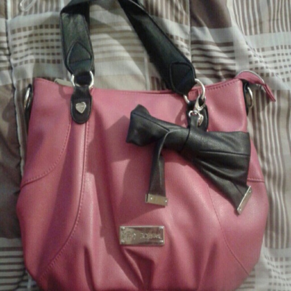 A Betsy Johnson hot pink purse.