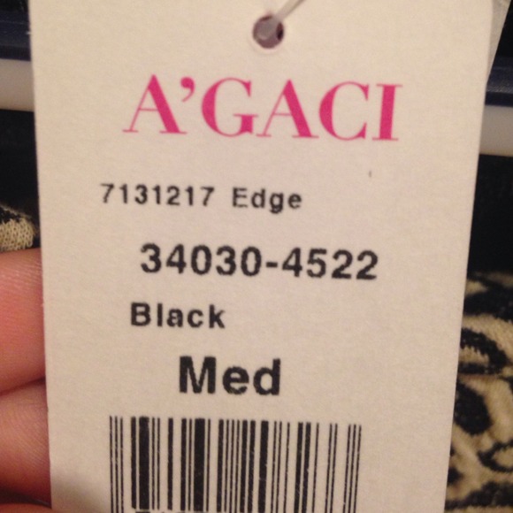 Patterned black and white peplum top - Picture 4 of 4