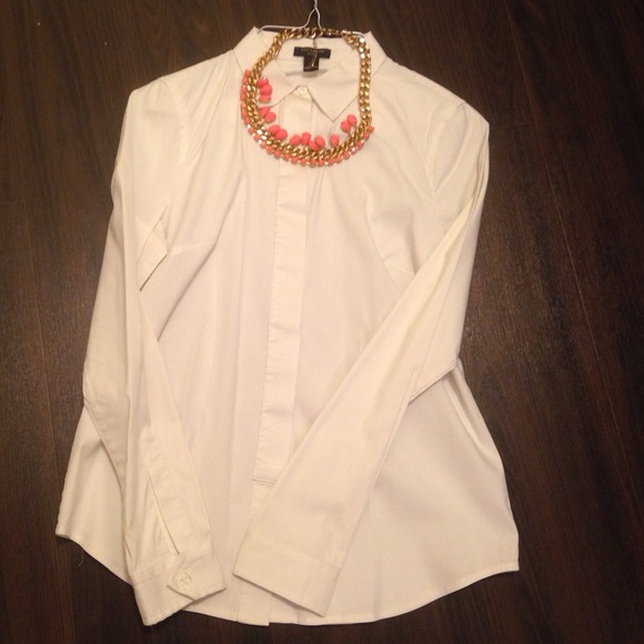 White tuxedo style women's button down shirt