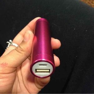 Pink portable phone charger