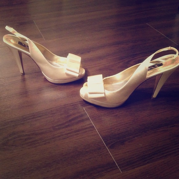 Cream colored peep toe satin platform heels