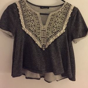 Jersey shirt with crocheted detail