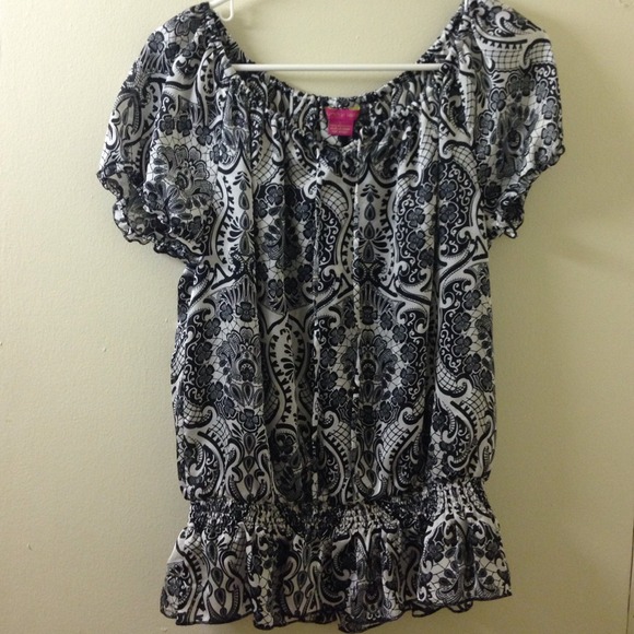 A silk like blouse beautiful lace and floral print