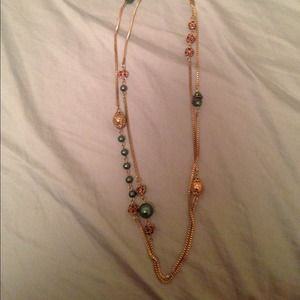 Long gold necklace