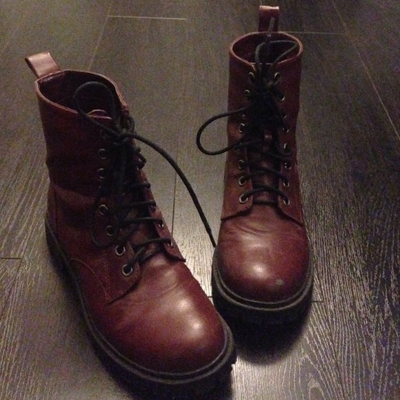 Burgundy lace up boots.