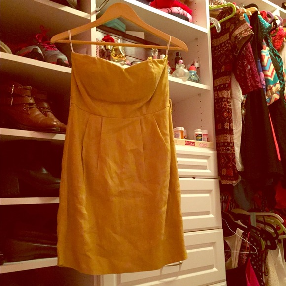 Adorable and fun mustard colored strapless dress!