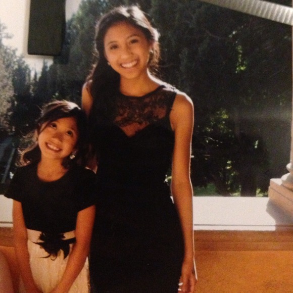 Black fitted dress with lace detail