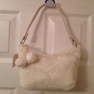 Brand new faux white fur bag with tags!!!