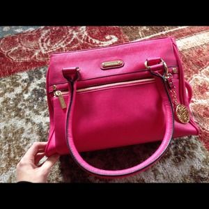 A bright pink Anne Klein bag