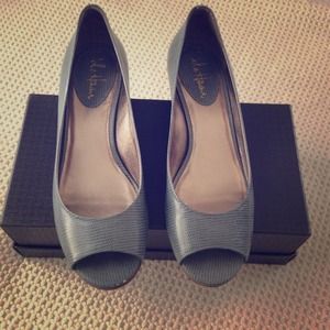 Light blue textured open-toe wedges