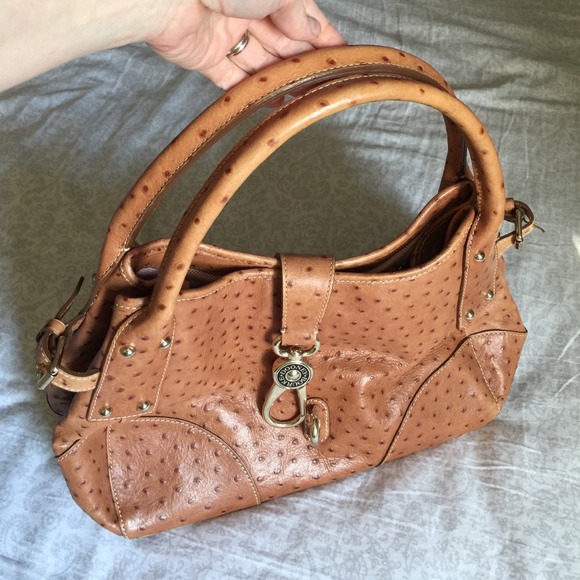 Gorgeous  luggage color Dooney and Bourke