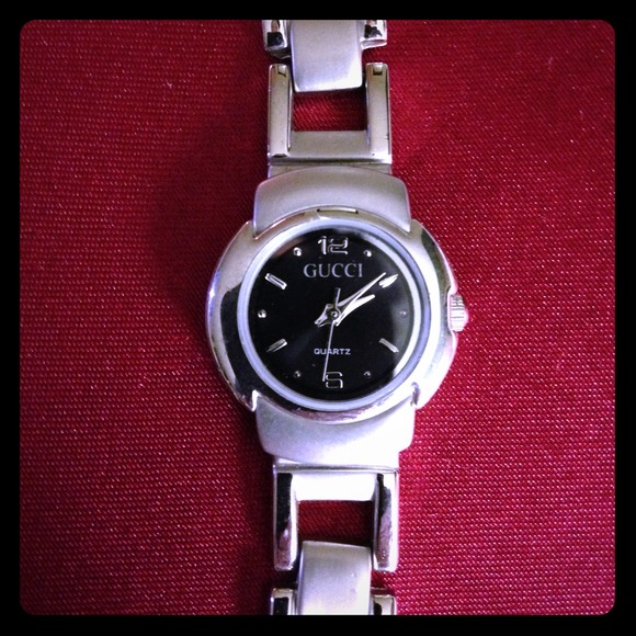 Gucci Watch.