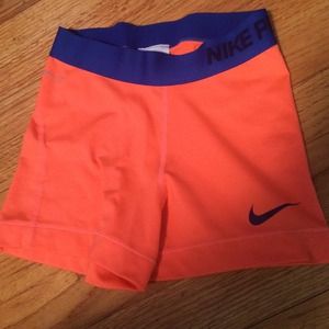 Neon orange Nike pros