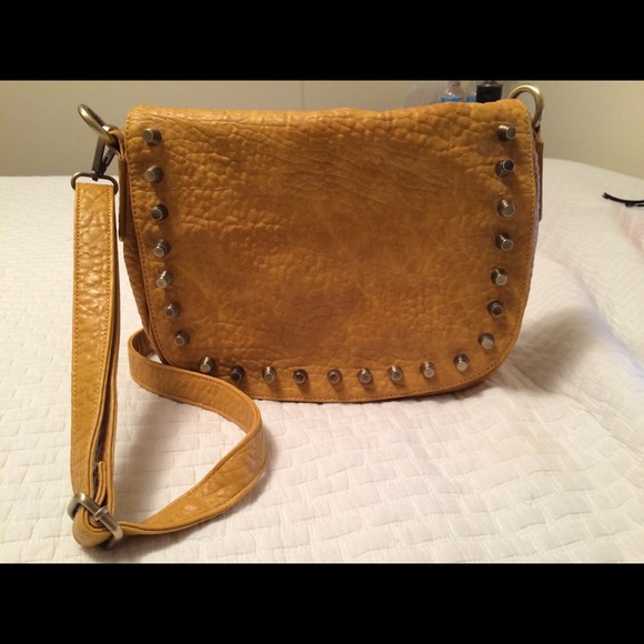 Mustard spiked cross body