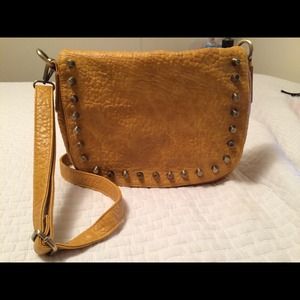 Mustard spiked cross body