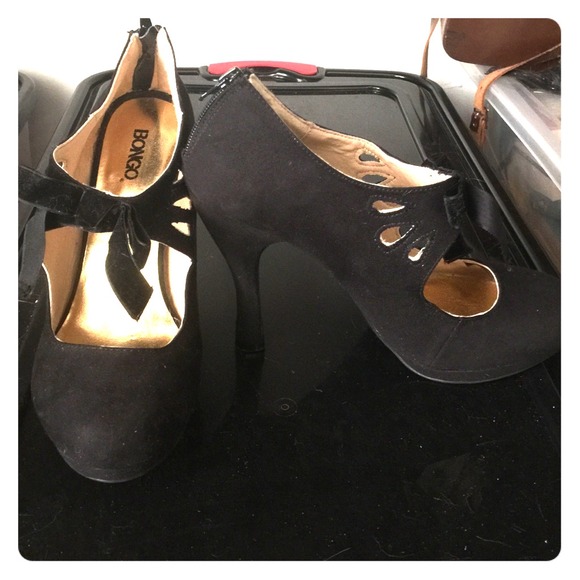 Black suede heels with bows