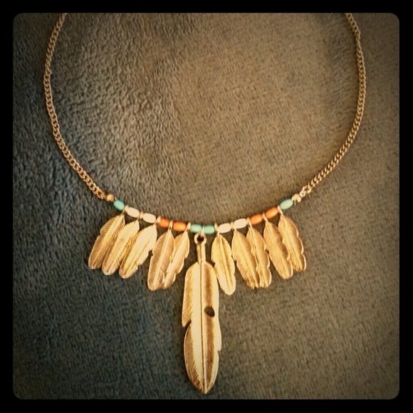 Gold Feather Statement Necklace.