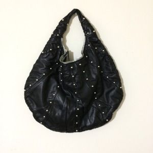 Genuine leather studded bag.