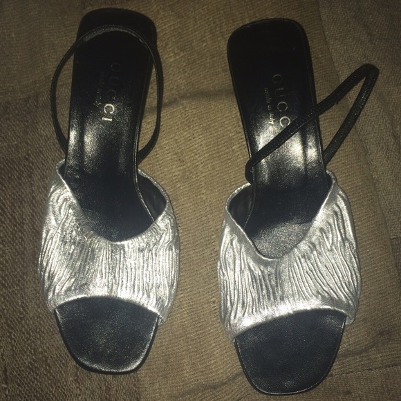 Gucci silver metallic slingback pumps.