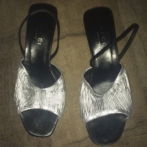 Gucci silver metallic slingback pumps.