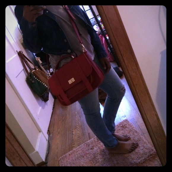 Red satchel/cross body bag.