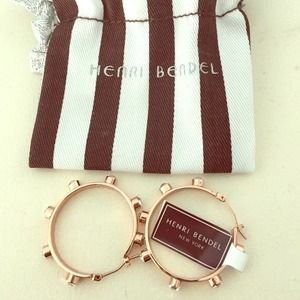 Rose gold Henri Bendel hoop earrings with diamonds