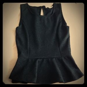 Black peplum top with design