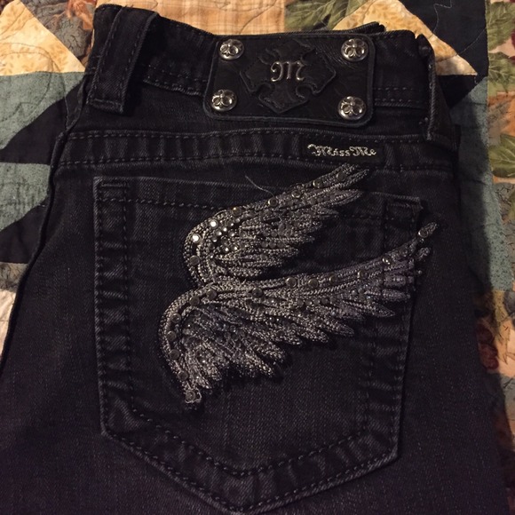 Miss Me size 28 skinny jeans. Grey black in color.
