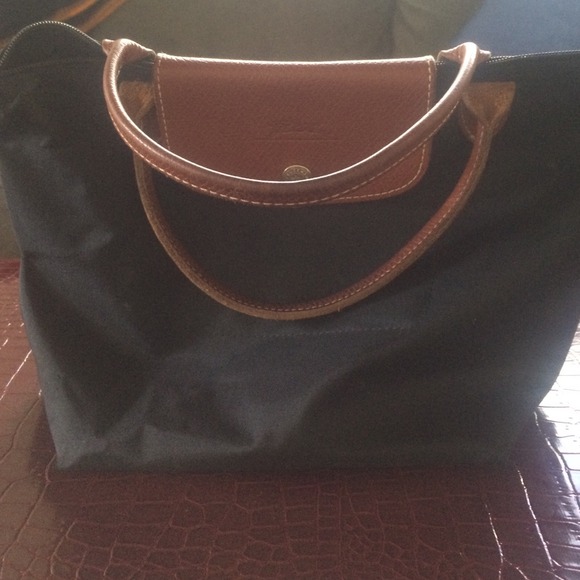 Black longchamp mini purse.