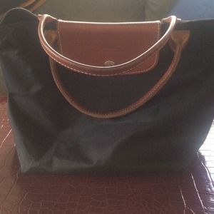 Black longchamp mini purse.