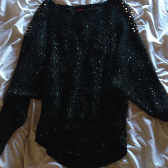 Black sparkly sweater with gold studs on the side