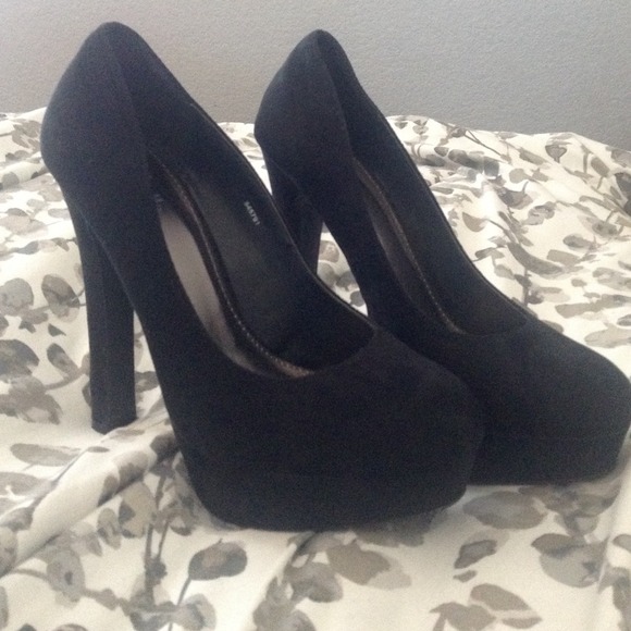 Black suede pumps/ high heels. About 5 inch heel