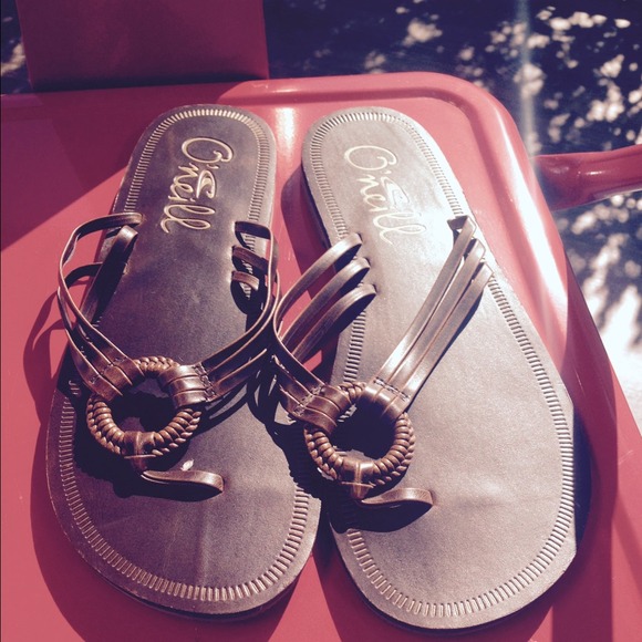 O'Neill Flip Flops with Circle Detail.