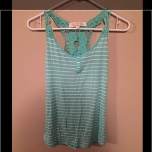 Turquoise lace back tank top.