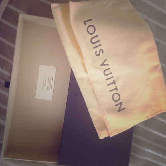 Louis Vuitton dust bag and box.