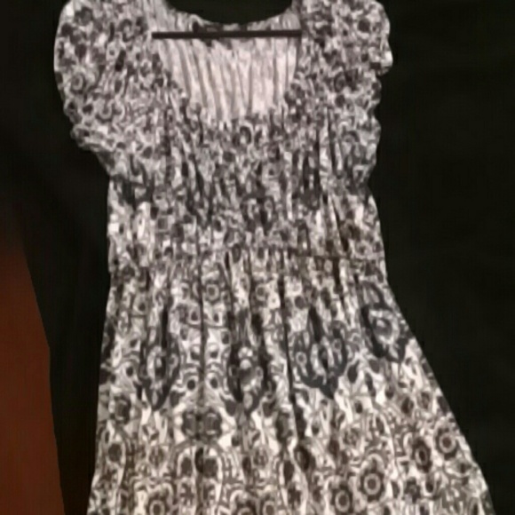 Tunic length flower top with cap sleeves