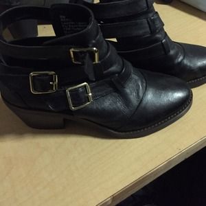 Steve Madden black boots with gold buckles