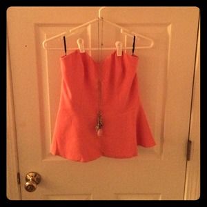 Strapless pink peplum top