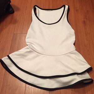 White peplum top with black piping