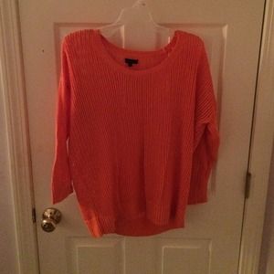 Loose fitting orange sweater